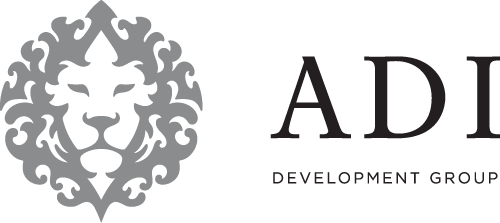 Logo of Adi Developments featuring a lion emblem and the text "ADI DEVELOPMENT GROUP," representing the brand's identity in real estate development.